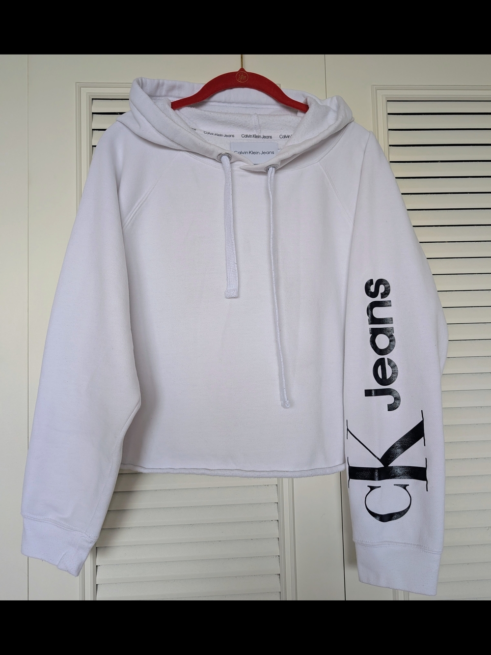 Calvin Klein Jeans White Cropped Hoodie Sweater with Black Sleeve Logo
